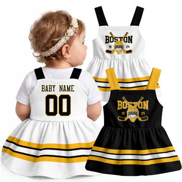 Personalized Boston hockey baby suspender dress shown on baby with Black and White city-color styles