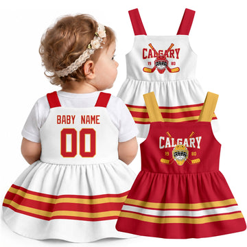 Personalized Calgary hockey baby suspender dress shown on baby with Red and White city-color styles