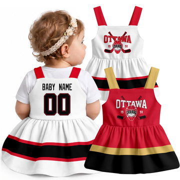 Personalized Ottawa hockey baby suspender dress shown on baby with Red and White city-color styles