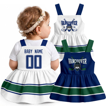 Personalized Vancouver hockey baby suspender dress shown on baby with Blue and White city-color styles