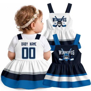 Personalized Winnipeg hockey baby suspender dress shown on baby with Navy and White city-color styles