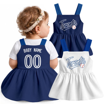 Toronto-inspired baseball baby strap dress modeled in Navy, with Navy and White front designs shown
