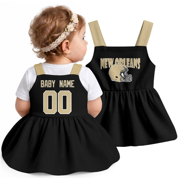 Personalized New Orleans football baby suspender dress shown on baby in Black city-color style