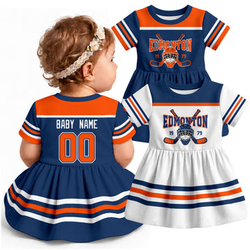 Personalized Edmonton hockey baby bodysuit dress shown on baby with Royal and White city-color styles