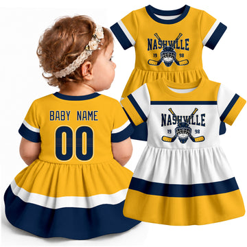 Personalized Nashville hockey baby bodysuit dress shown on baby with Gold and White city-color styles