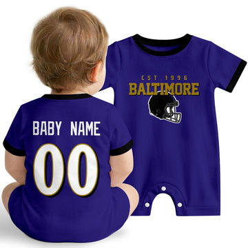 Baby wearing Baltimore football-inspired personalized romper in purple, featuring custom name and number design with sporty varsity lettering and football helmet graphic