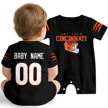Baby wearing Cincinnati football-inspired personalized romper in black, featuring custom name and number design with sporty varsity lettering and football helmet graphic