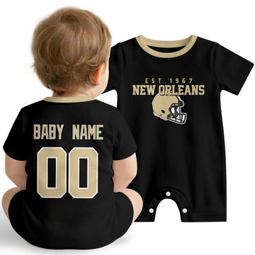 Baby wearing New Orleans football-inspired personalized romper in black, featuring custom name and number design with sporty varsity lettering and football helmet graphic