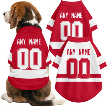 Dog wearing custom hockey-style jersey in Red and White colors with personalized name and number