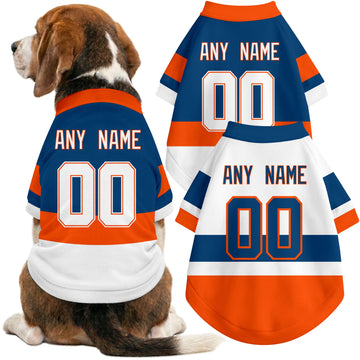 Dog wearing custom hockey-style jersey in Royal and White colors with personalized name and number