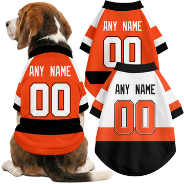 Dog wearing custom hockey-style jersey in Orange and White colors with personalized name and number