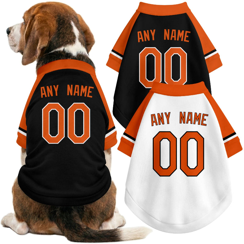Dog wearing custom baseball-style jersey in Black and White colors with personalized name and number