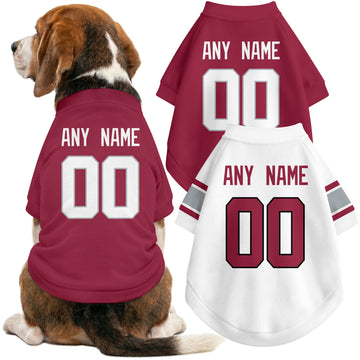 Dog wearing custom football-style dog jersey in red white black with personalized name and number