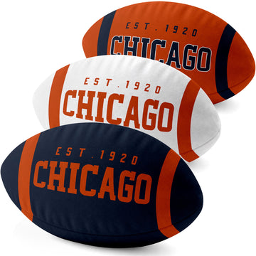 Chicago personalized football shaped pillow collection in Navy, White and Orange with city lettering