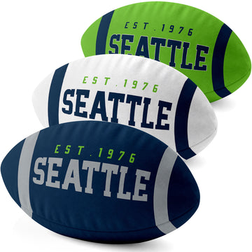Seattle personalized football shaped pillow collection in Navy, White and Neon Green with city lettering