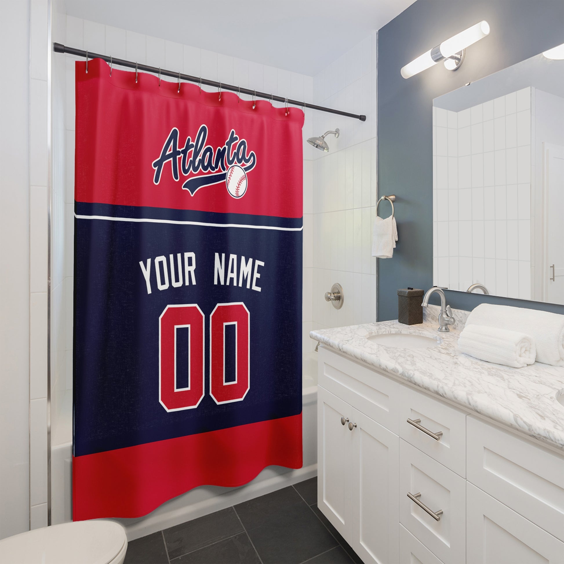 Personalized Atlanta baseball shower curtain in red navy and white hanging in a modern bathroom with custom name and number