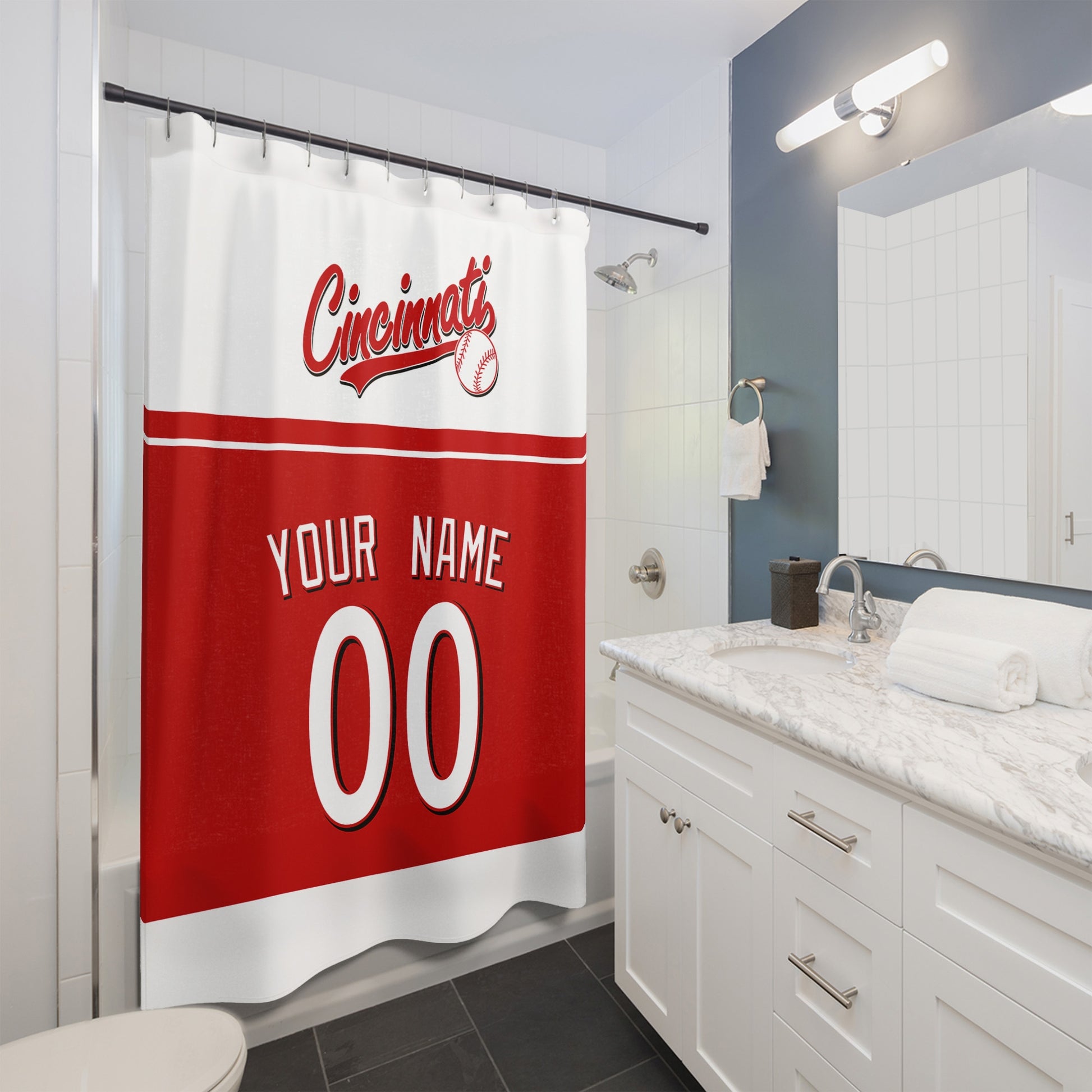 Personalized Cincinnati baseball shower curtain in red white and black hanging in a modern bathroom with custom name and number