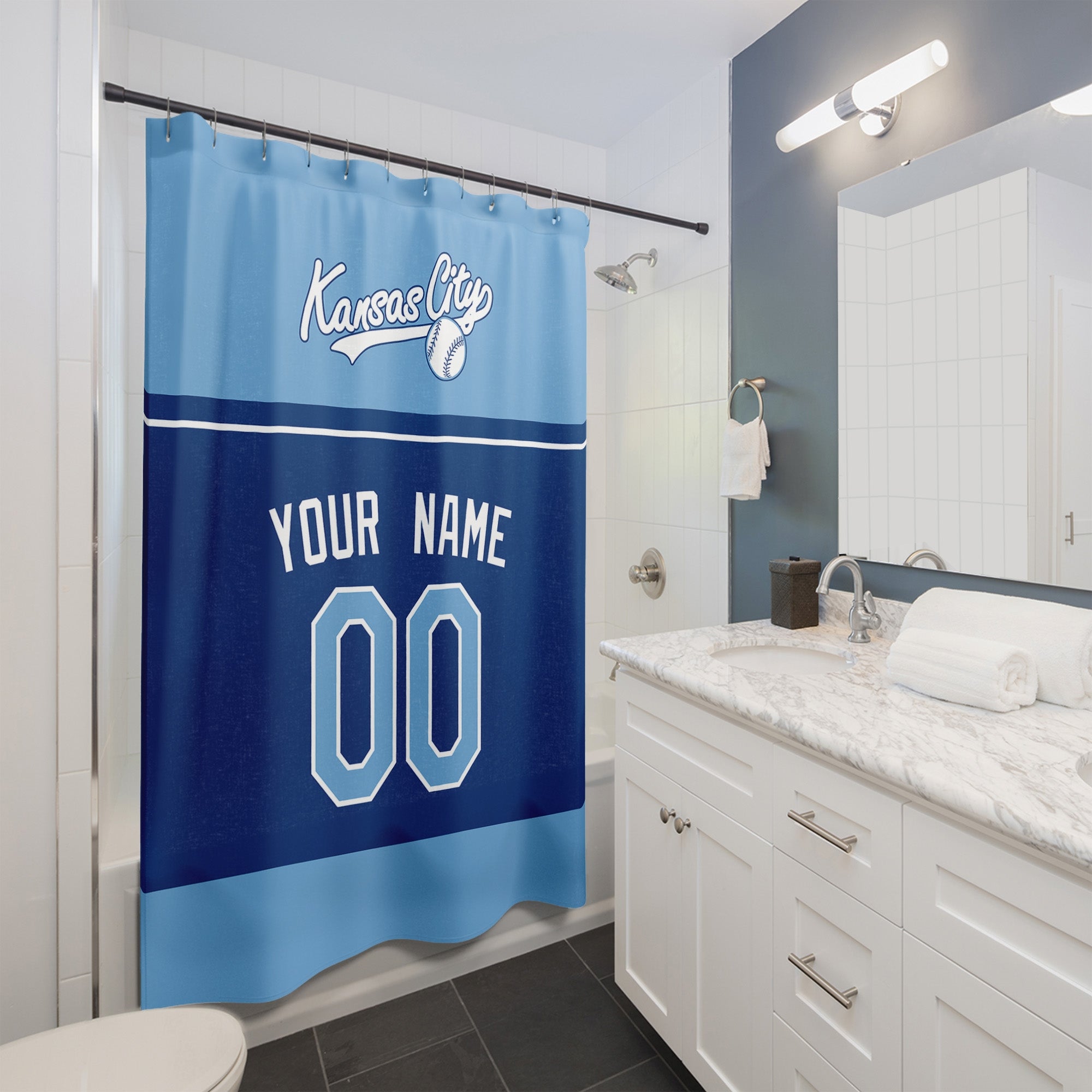 Personalized Kansas City baseball shower curtain in light blue navy and white hanging in a modern bathroom with custom name and number