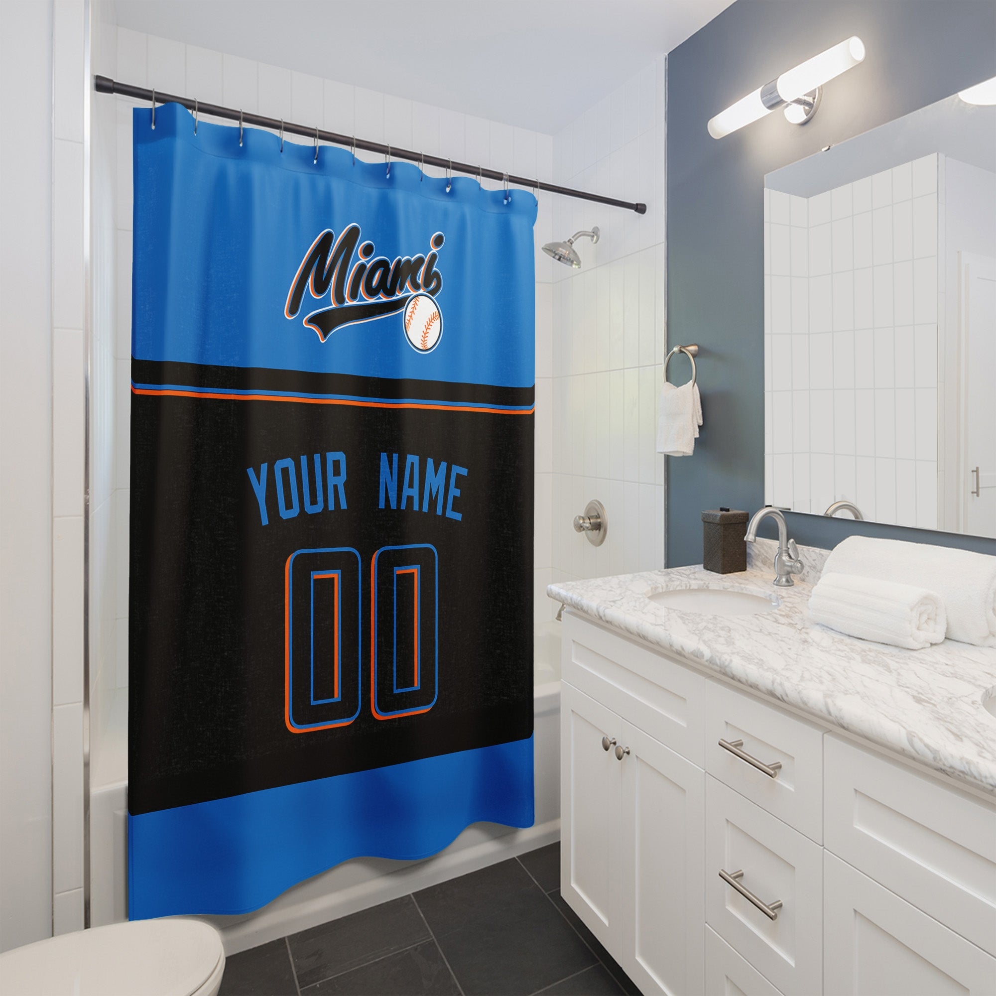 Personalized Miami baseball shower curtain in blue black and orange hanging in a modern bathroom with custom name and number