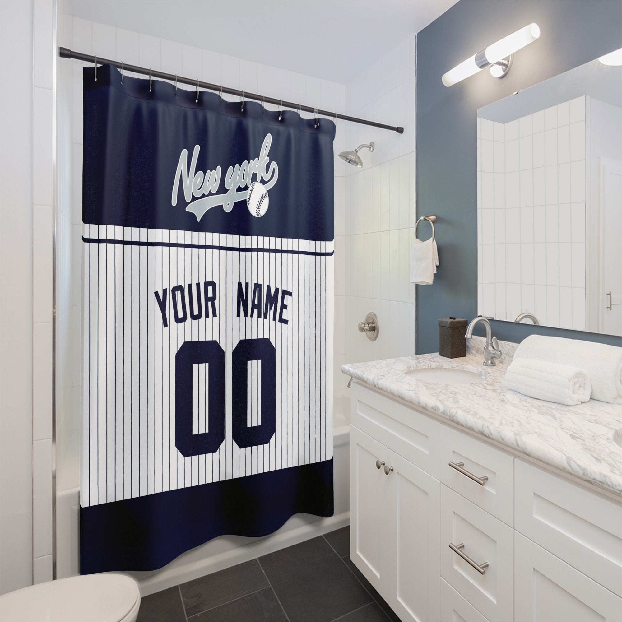Personalized New York Navy baseball shower curtain in navy white and gray hanging in a modern bathroom with custom name and number