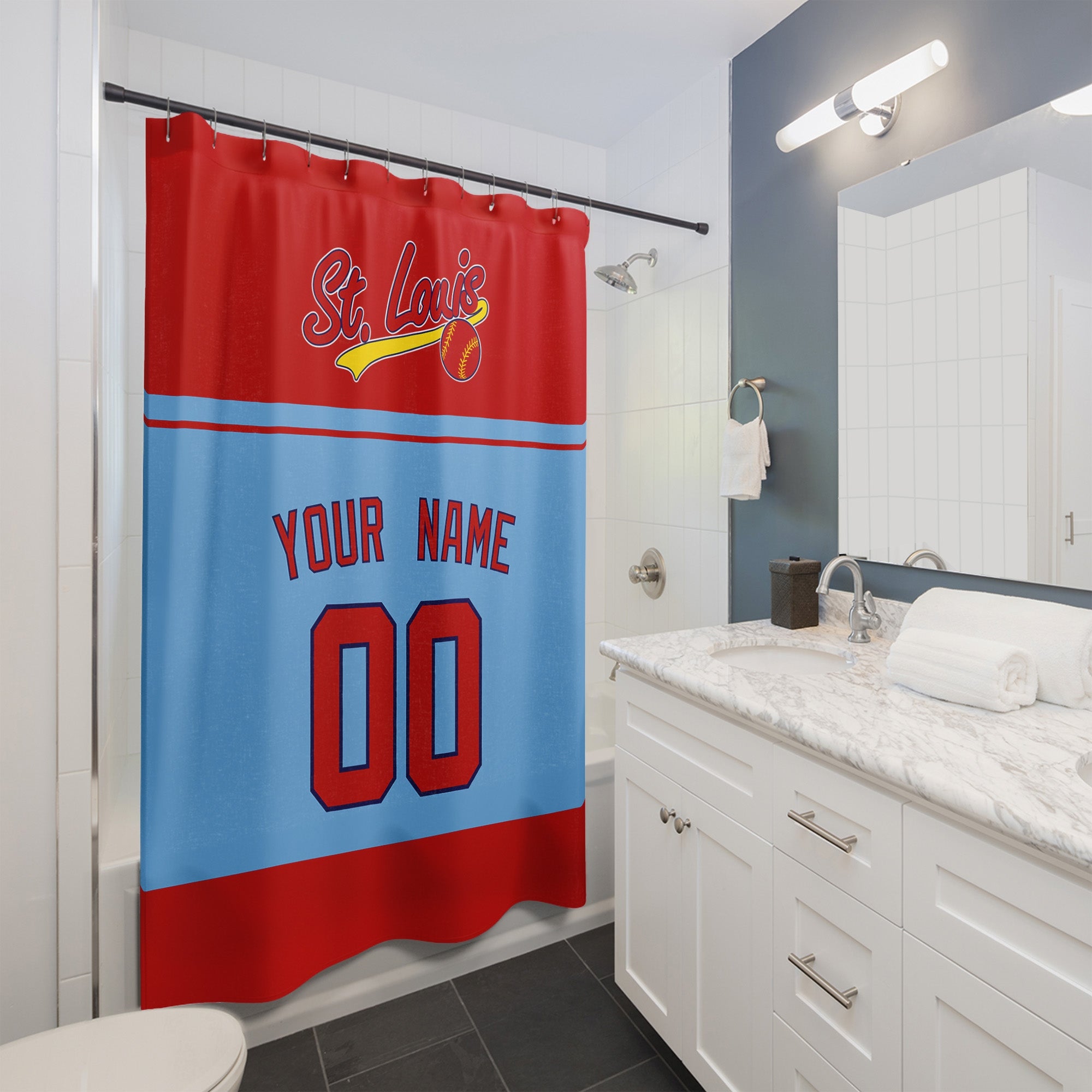 Personalized St Louis baseball shower curtain in red light blue and gold hanging in a modern bathroom with custom name and number