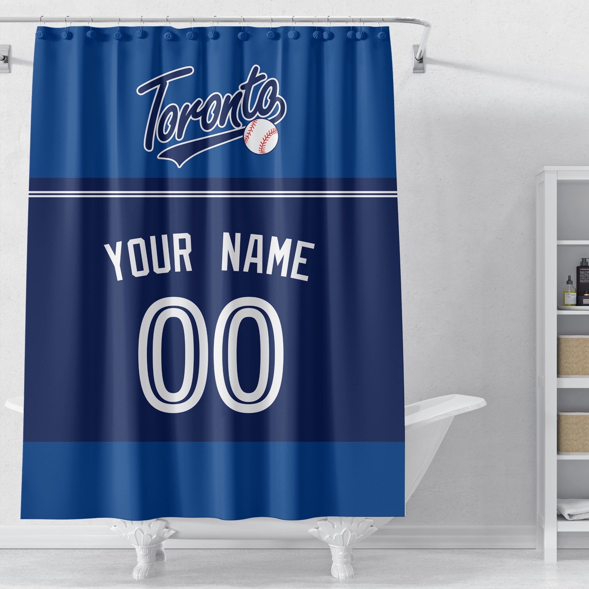 Personalized Toronto baseball shower curtain in royal blue navy and white displayed above a bathtub in a bright bathroom