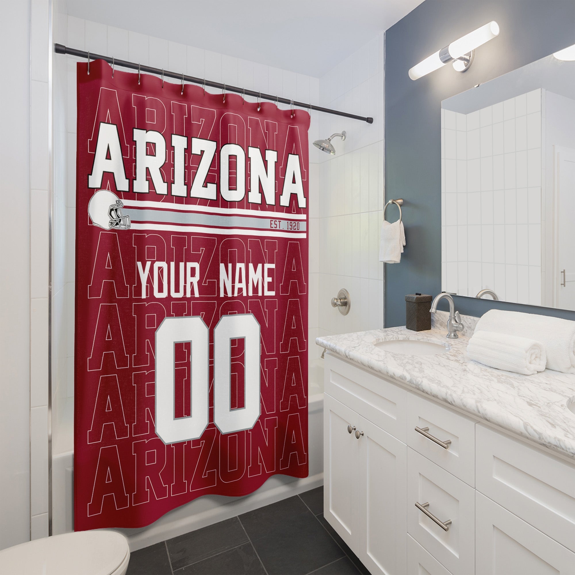 Personalized Arizona football shower curtain with custom name and number hanging in a modern bathroom