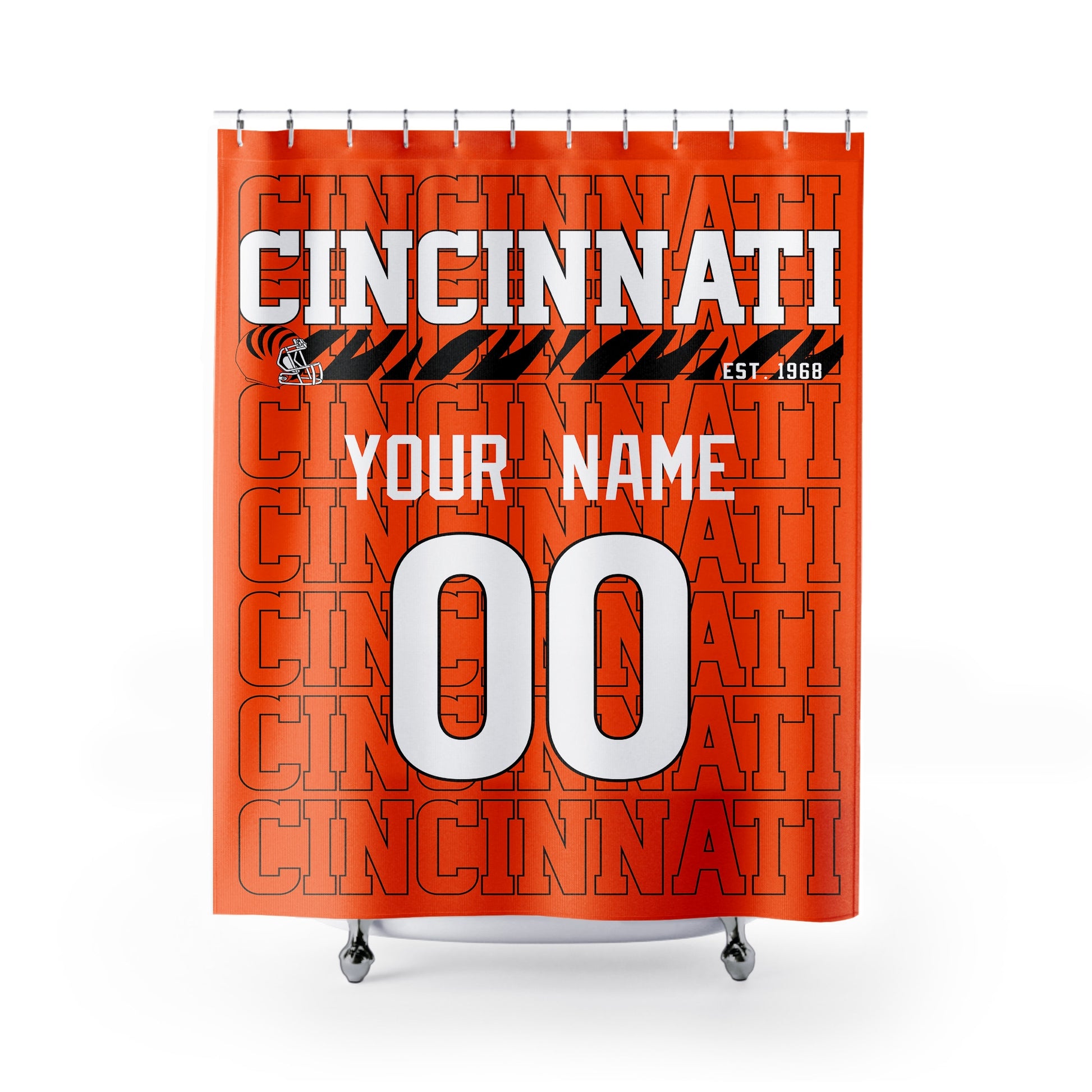 Personalized Cincinnati football shower curtain in orange black and white colors with custom name and number on a white background