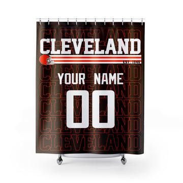 Personalized Cleveland football shower curtain in brown orange and white colors with custom name and number on a white background