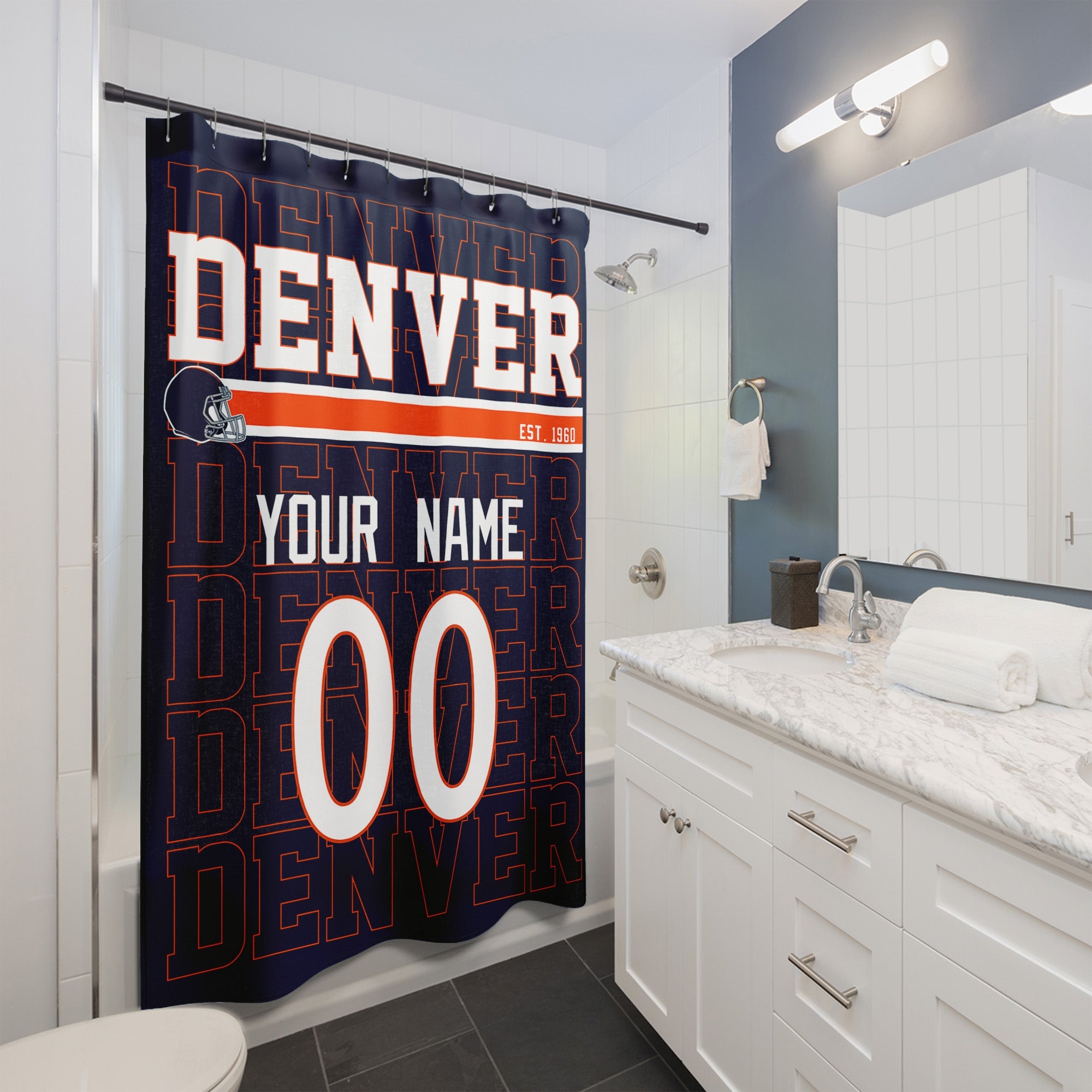 Personalized Denver football shower curtain with custom name and number hanging in a modern bathroom