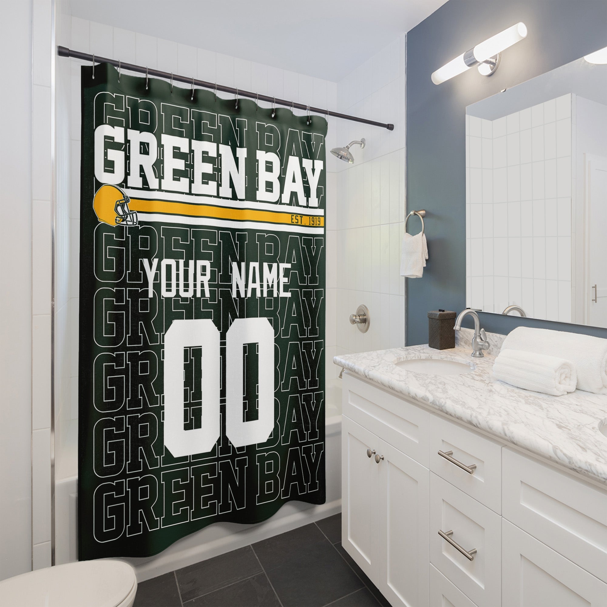 Personalized Green Bay football shower curtain with custom name and number hanging in a modern bathroom