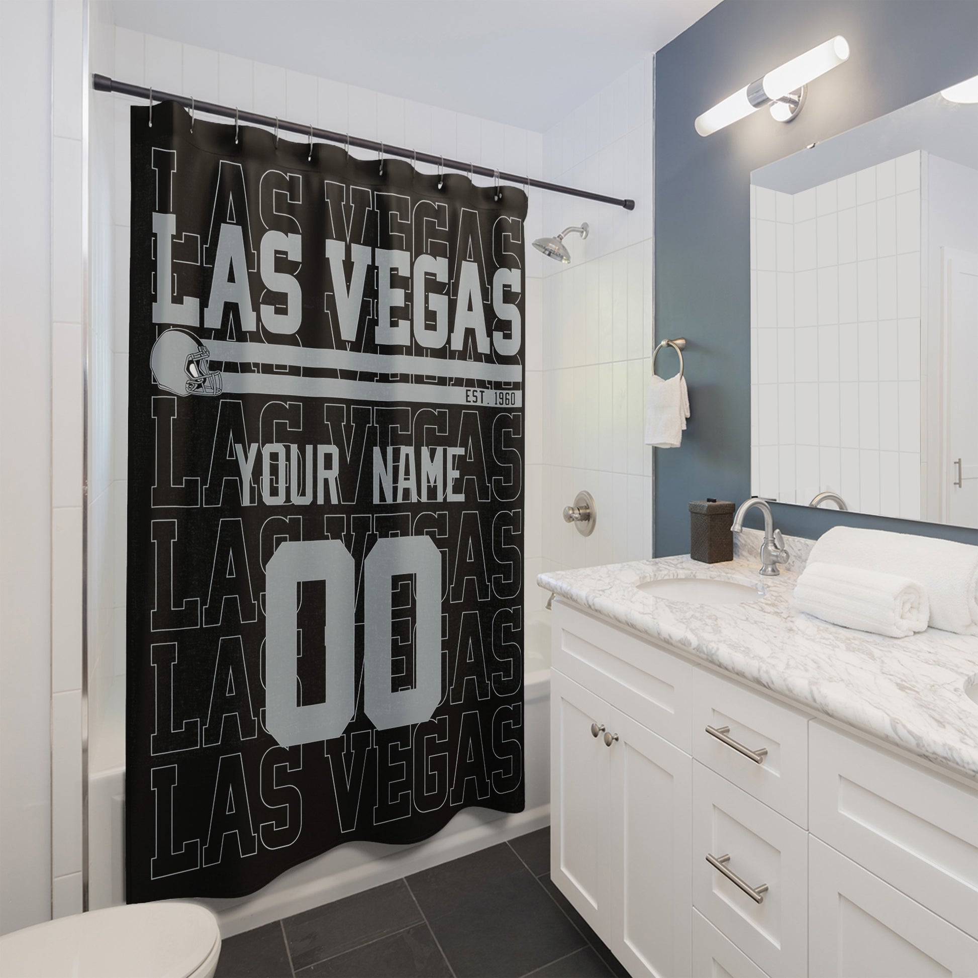 Personalized Las Vegas football shower curtain with custom name and number hanging in a modern bathroom