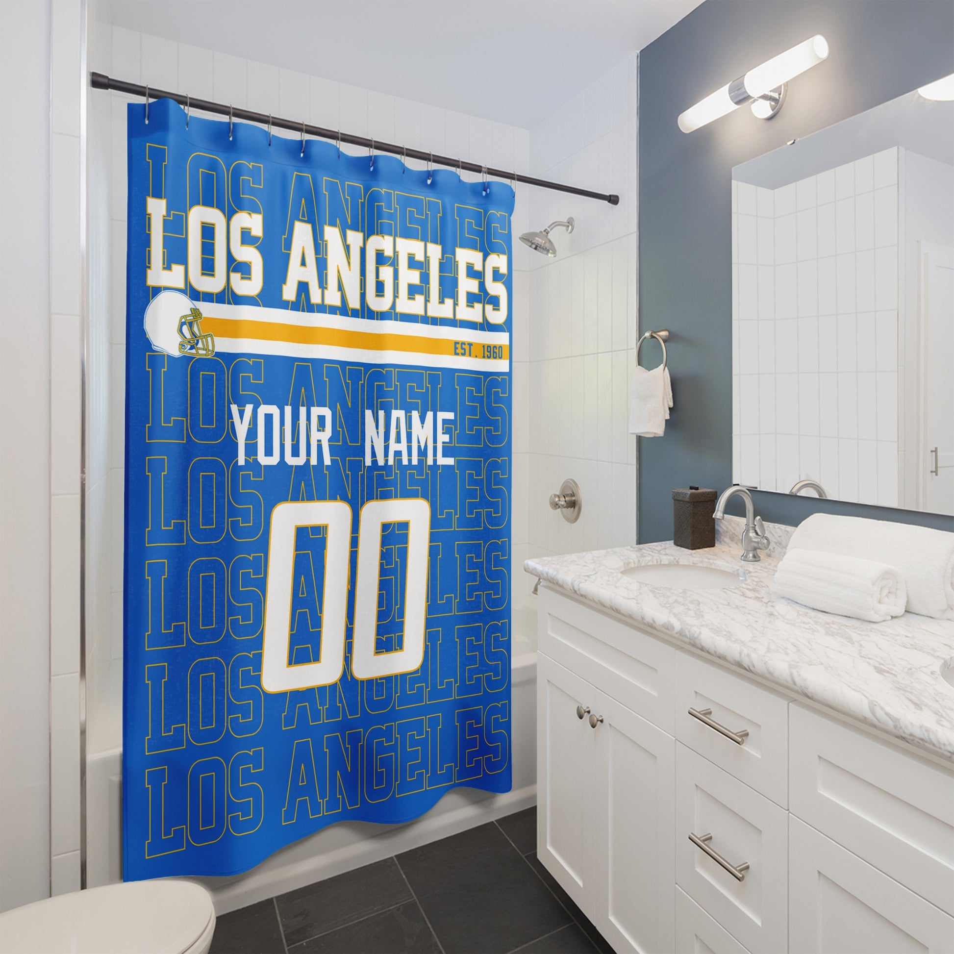 Personalized Los Angeles Blue and Yellow football shower curtain with custom name and number hanging in a modern bathroom
