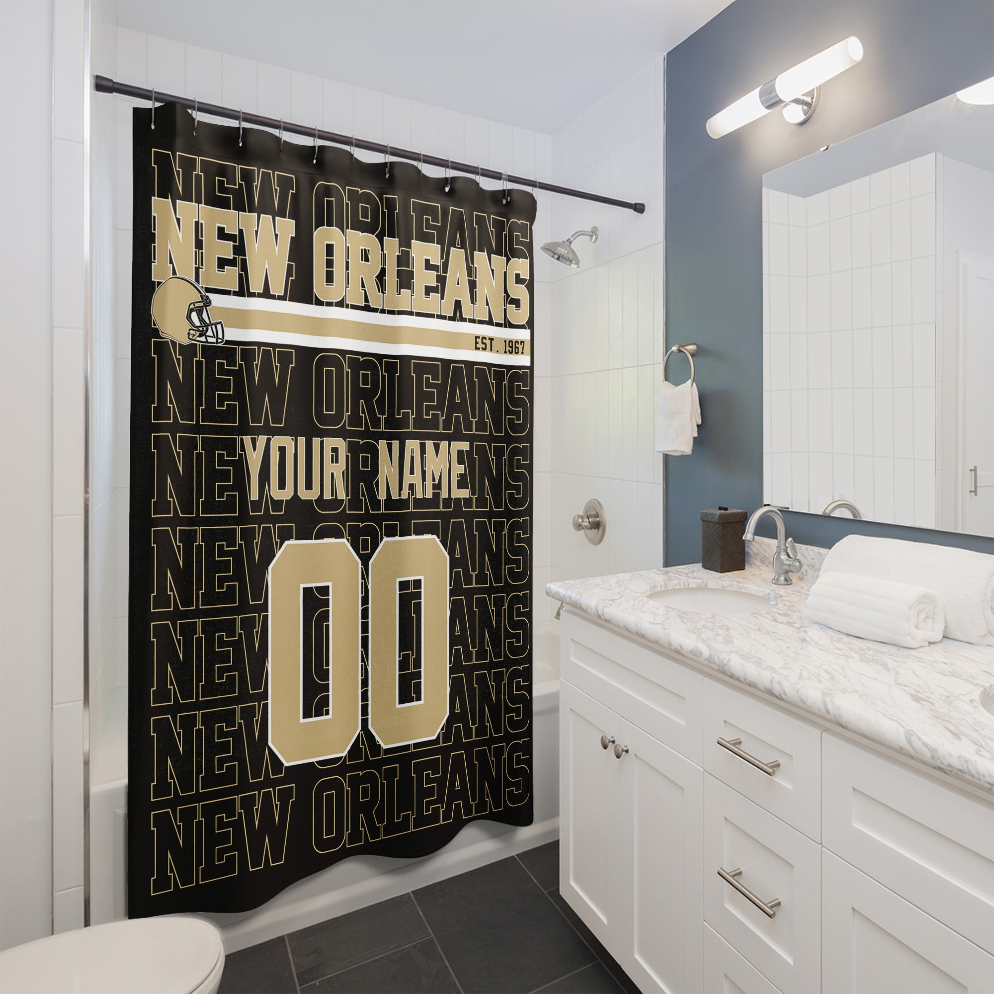 Personalized New Orleans football shower curtain with custom name and number hanging in a modern bathroom