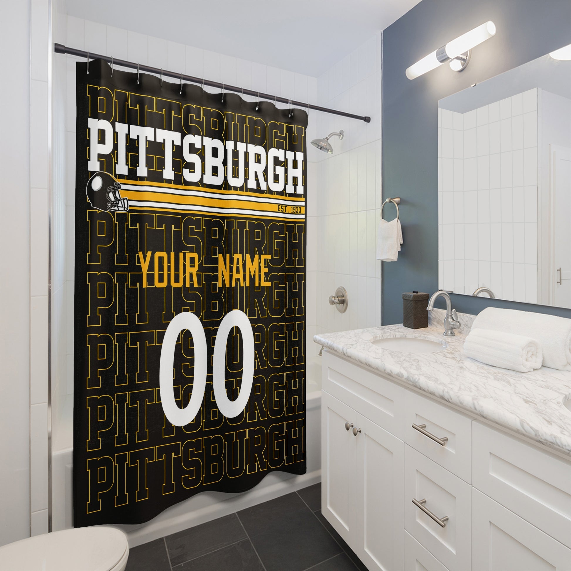 Personalized Pittsburgh football shower curtain with custom name and number hanging in a modern bathroom
