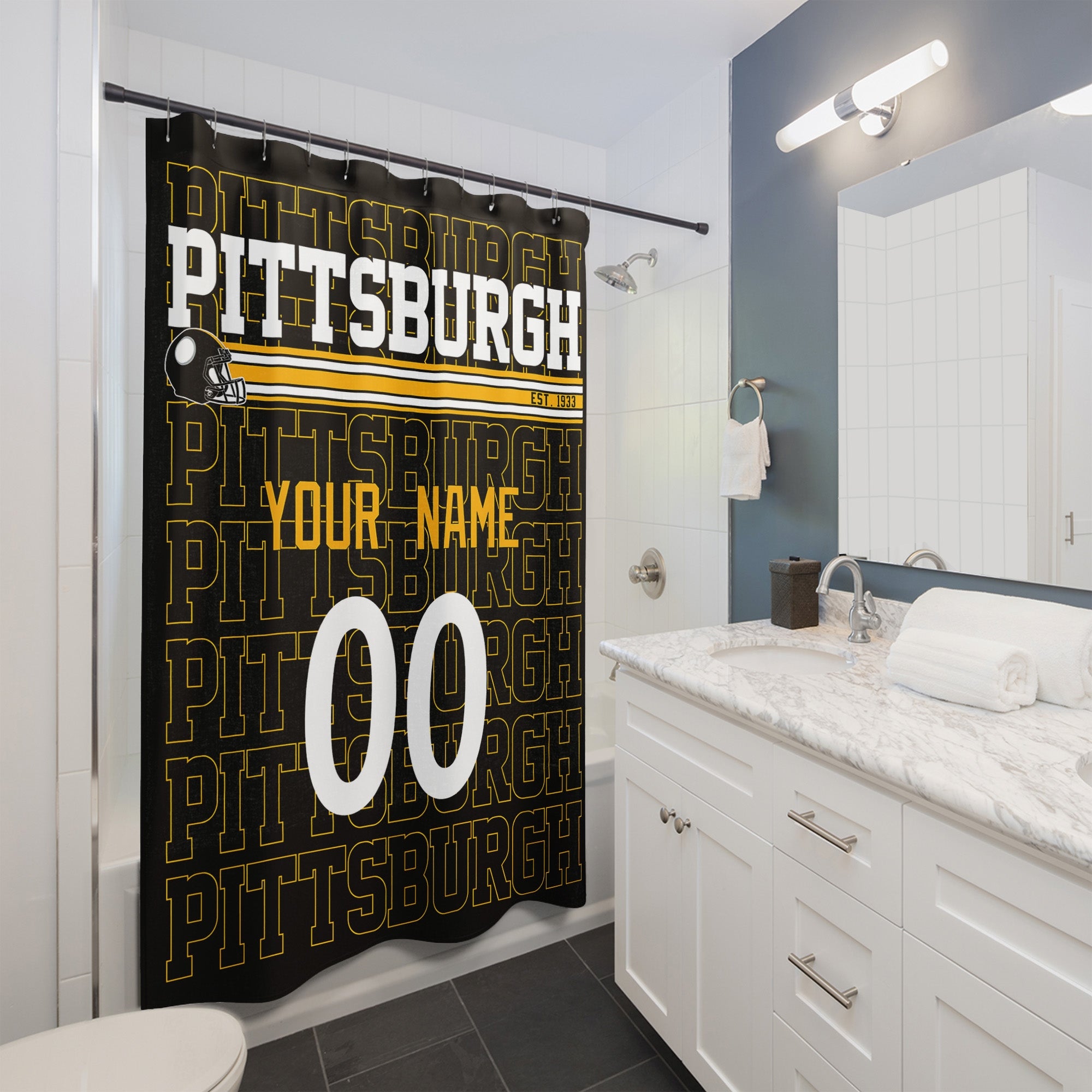 Personalized Pittsburgh football shower curtain with custom name and number hanging in a modern bathroom