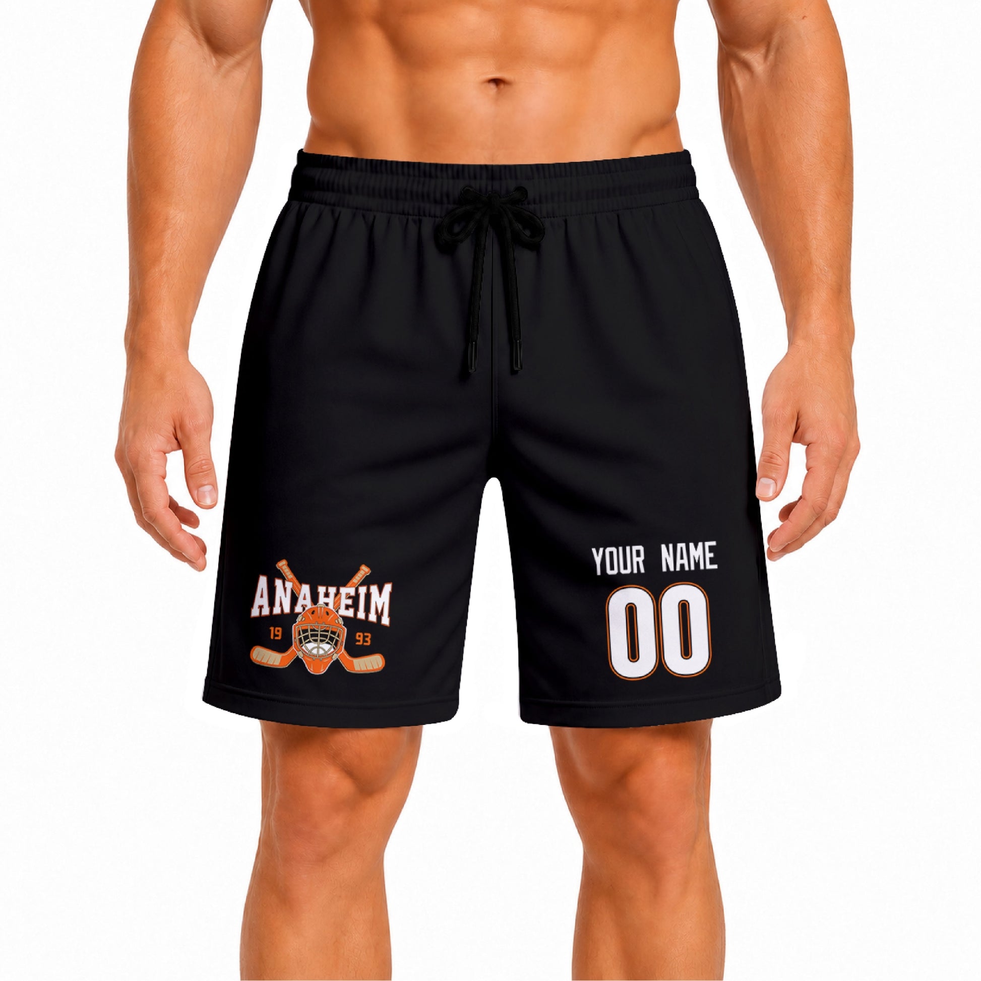 Black Anaheim-inspired hockey athletic shorts front view worn by male model, showcasing custom name, number, and team graphic