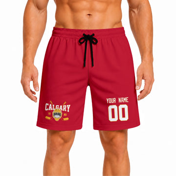 Red Calgary-inspired hockey athletic shorts front view worn by male model, showcasing custom name, number, and team graphic