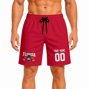 Red Florida-inspired hockey athletic shorts front view worn by male model, showcasing custom name, number, and team graphic