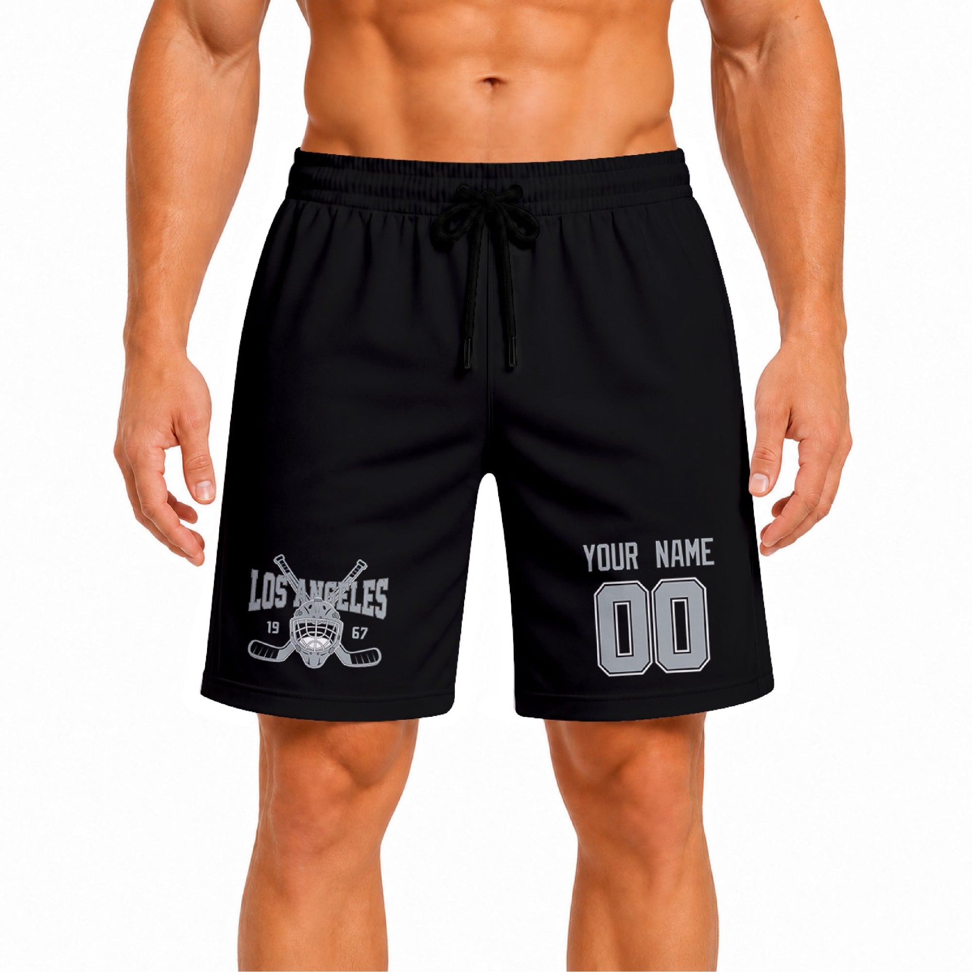 Black Los Angeles-inspired hockey athletic shorts front view worn by male model, showcasing custom name, number, and team graphic