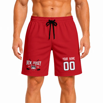 Red New Jersey-inspired hockey athletic shorts front view worn by male model, showcasing custom name, number, and team graphic