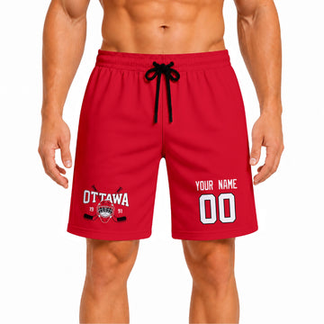 Red Ottawa-inspired hockey athletic shorts front view worn by male model, showcasing custom name, number, and team graphic