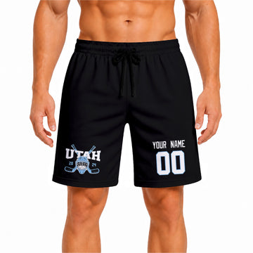 Black Utah-inspired hockey athletic shorts front view worn by male model, showcasing custom name, number, and team graphic